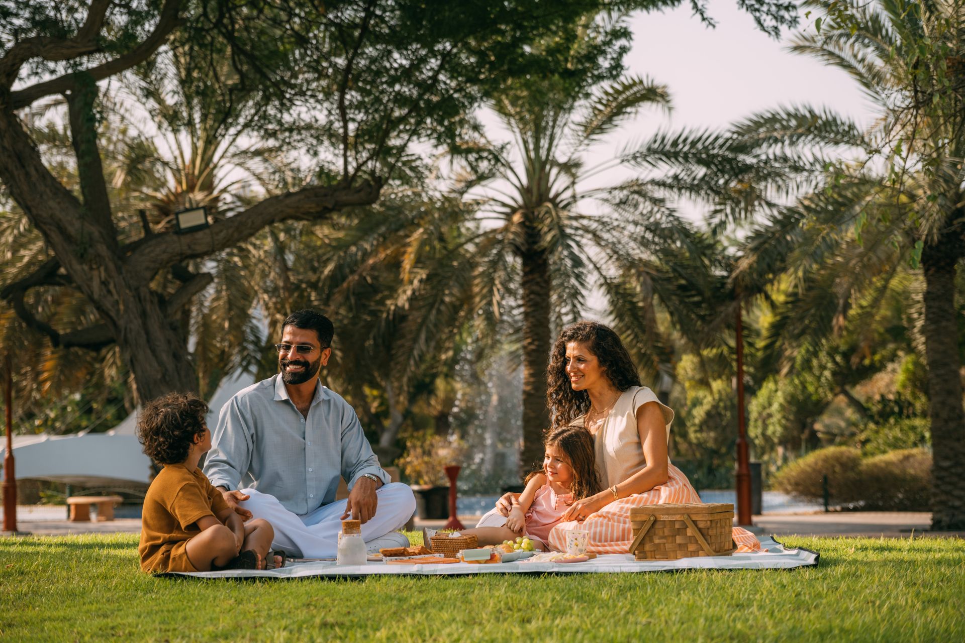 Family enjoying a picnic in Awali